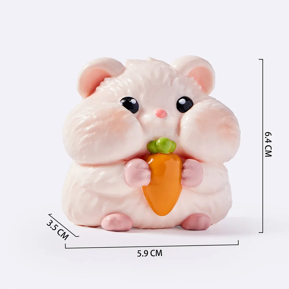 Hamster Holding Carrot — photo 2