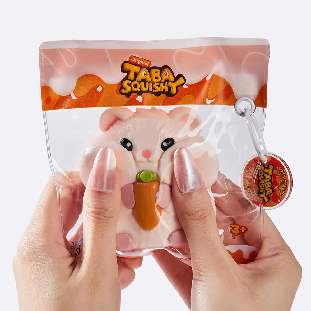 Hamster Holding Carrot — photo 4