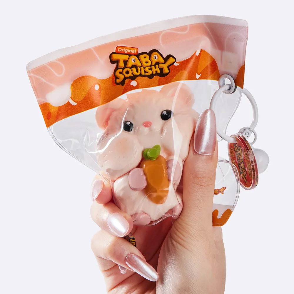 Hamster Holding Carrot — photo 5