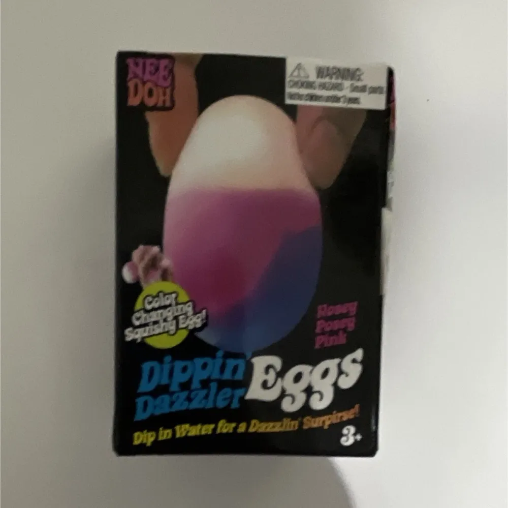 Nee-Doh Dippin Dazzler Color Changing Squishy Egg (Pink)