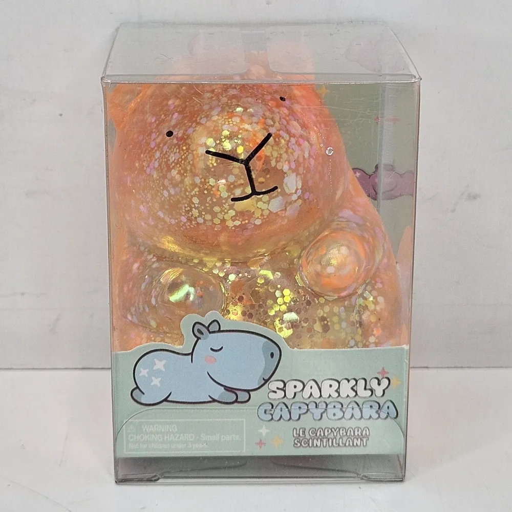 Orb Curiosities Sparklee Capybara Orange Squishy