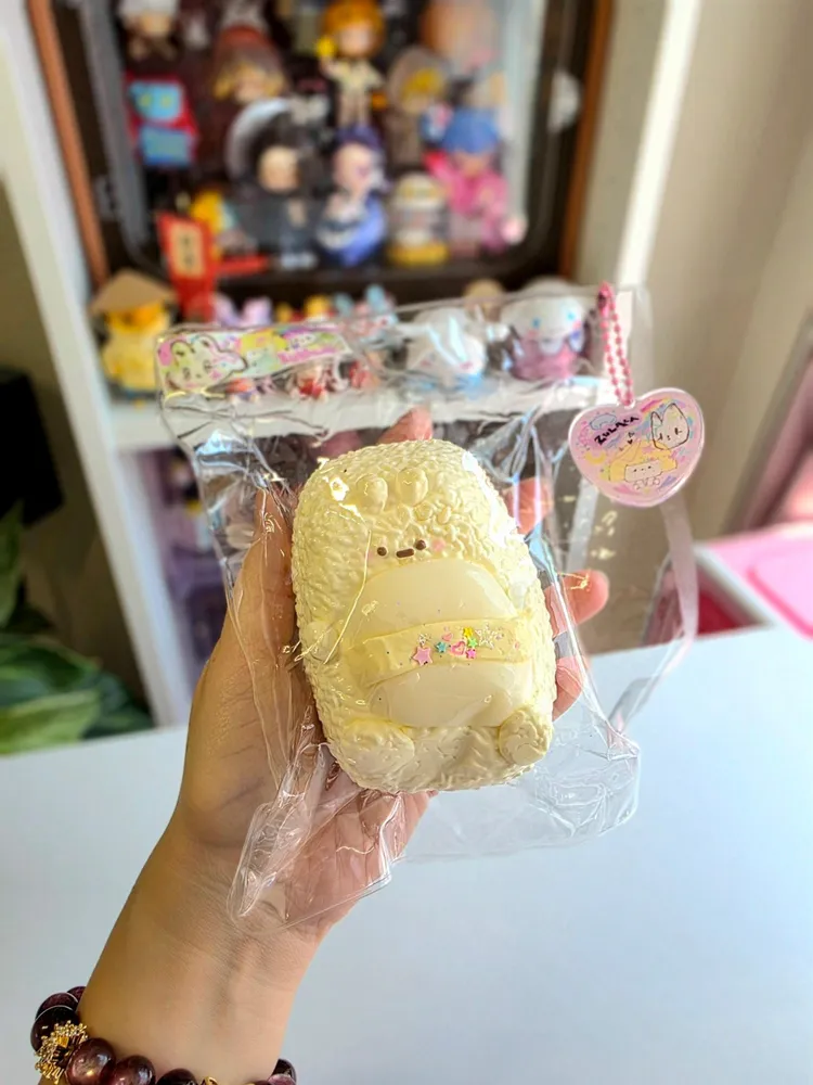Taba Mochi Rice Roll Squishy by Zulala Studio